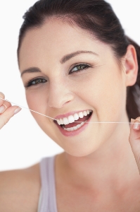 Floss Your Way Towards Having Whiter Teeth