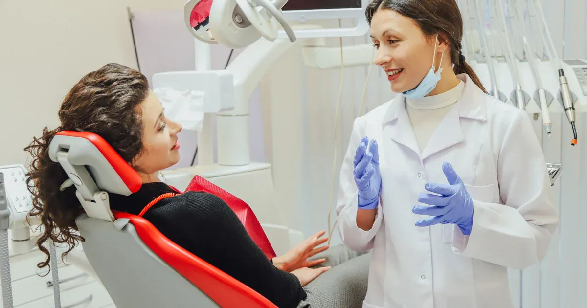 Dentist talking with a patient in Bondi Beach