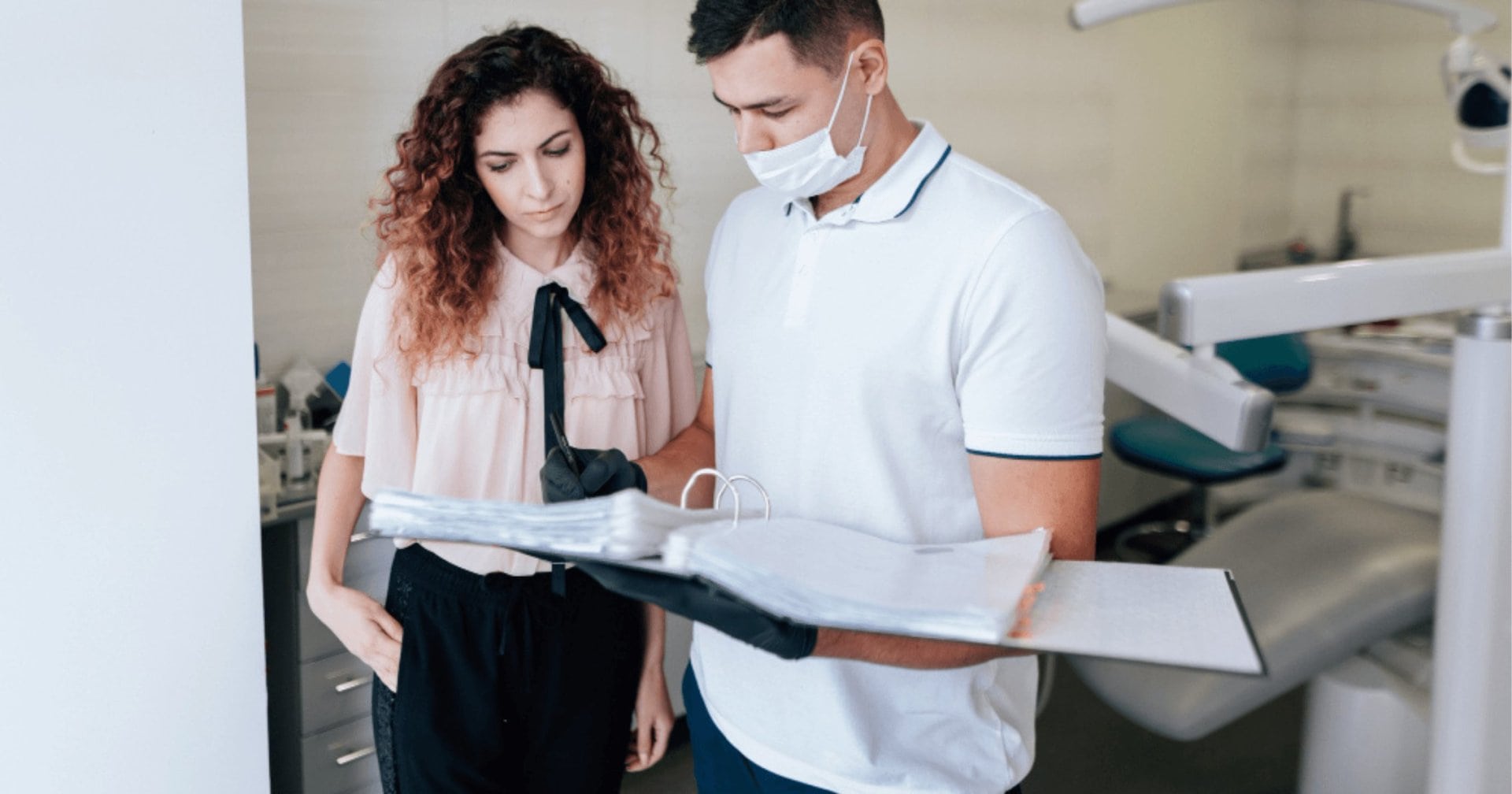 Dentist reviewing treatment options that affect smile makeover cost in Bondi